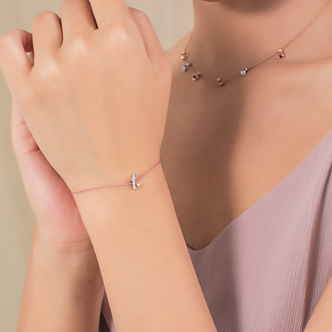 "J" string bracelet